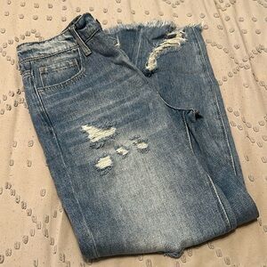 Distressed medium wash jeans